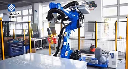 Robot Perekat dengan Sistem Dispenser Enam Sumbu